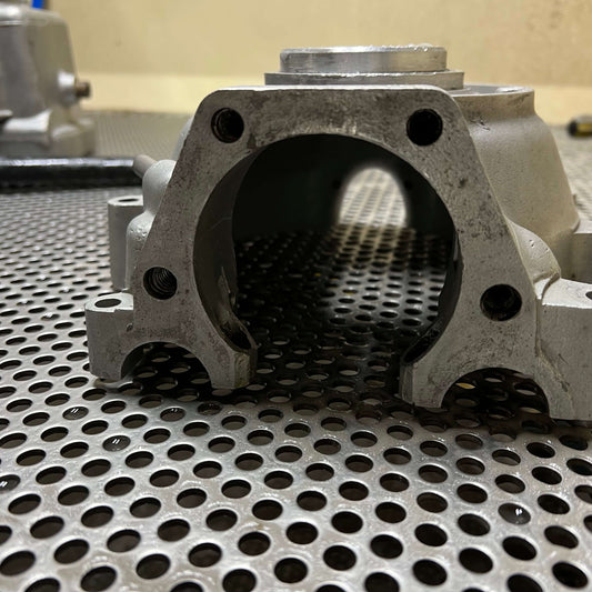 How Does Vapour Blasting Work? close-up of a metal component ready for aqua blasting in Lincolnshire.