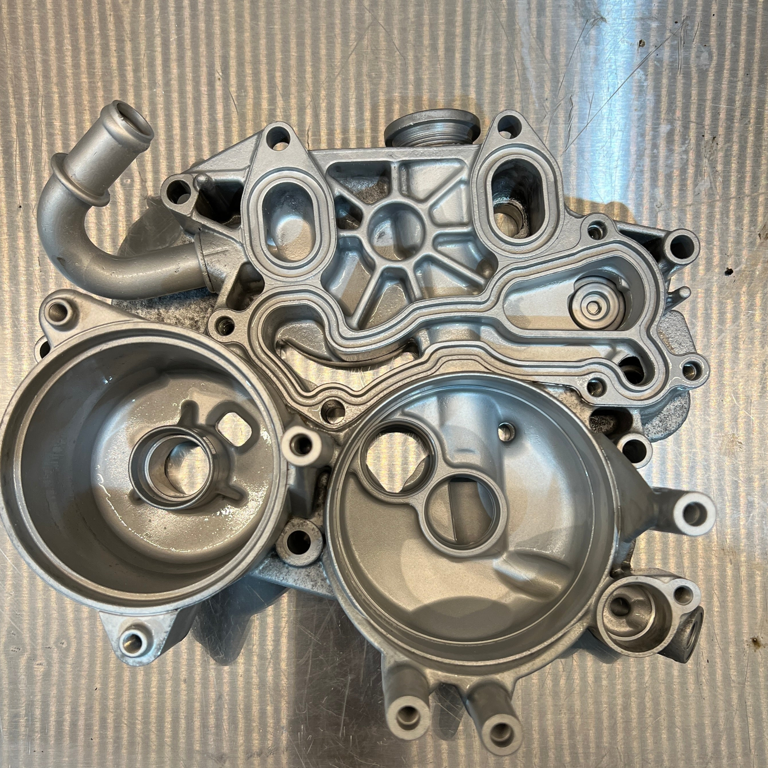 Metal engine block on a textured surface